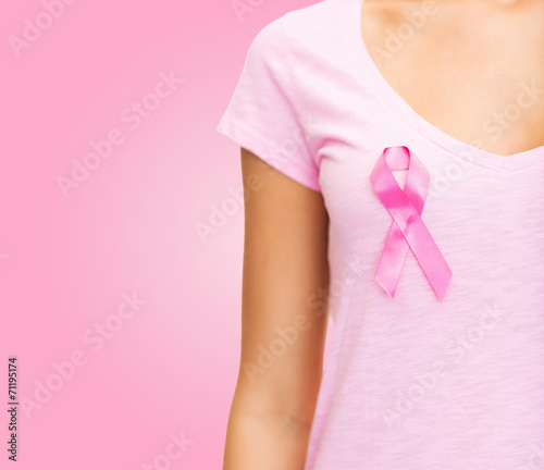 close up of woman with cancer awareness ribbon