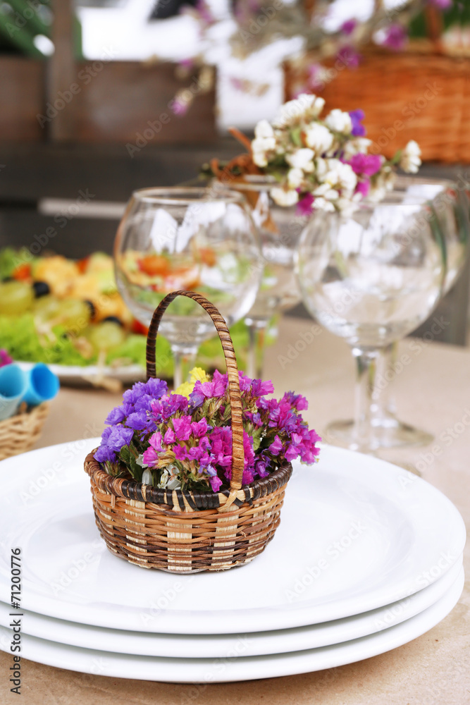 Buffet table with dishware waiting for guests Buffet table with dishware waiting for guests