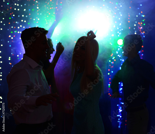 Young people dancing at party