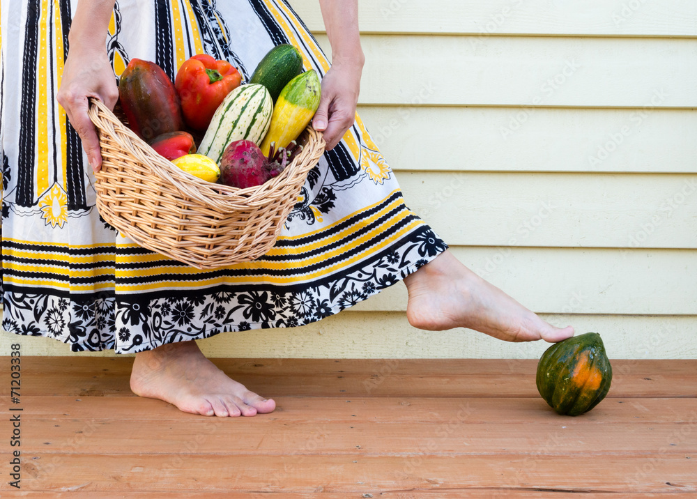 Fototapeta premium Woman with veggie basket