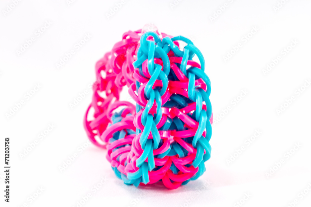 close up of bracelets made with rubber loom bands close up of bracelets made with rubber loom bands