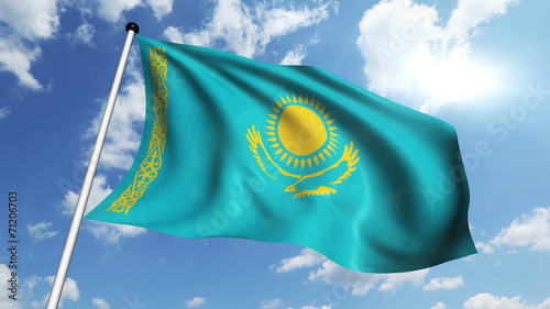 flag of Kazakhstan with fabric structure against a cloudy sky photo