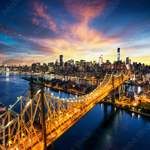 New York City - sunset over manhattan with Queensboro bridge photo