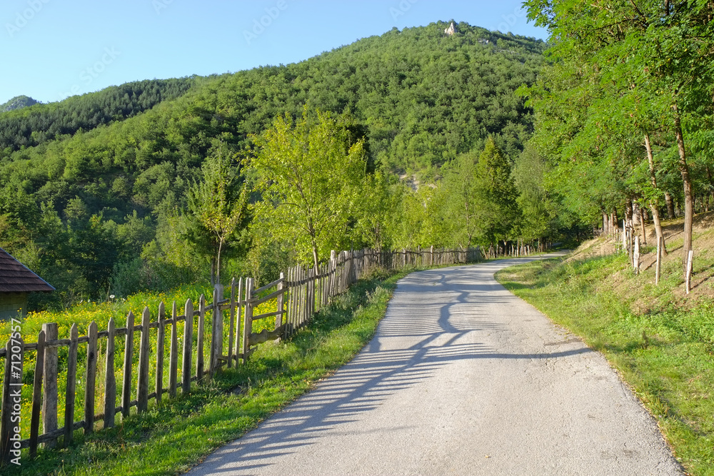 Rural Road With Wooden Fence In Serbia