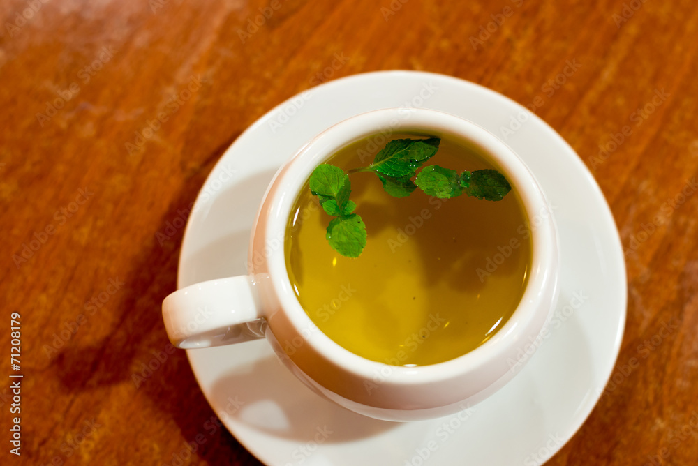 glass cup with green tea and mint glass cup with green tea and mint