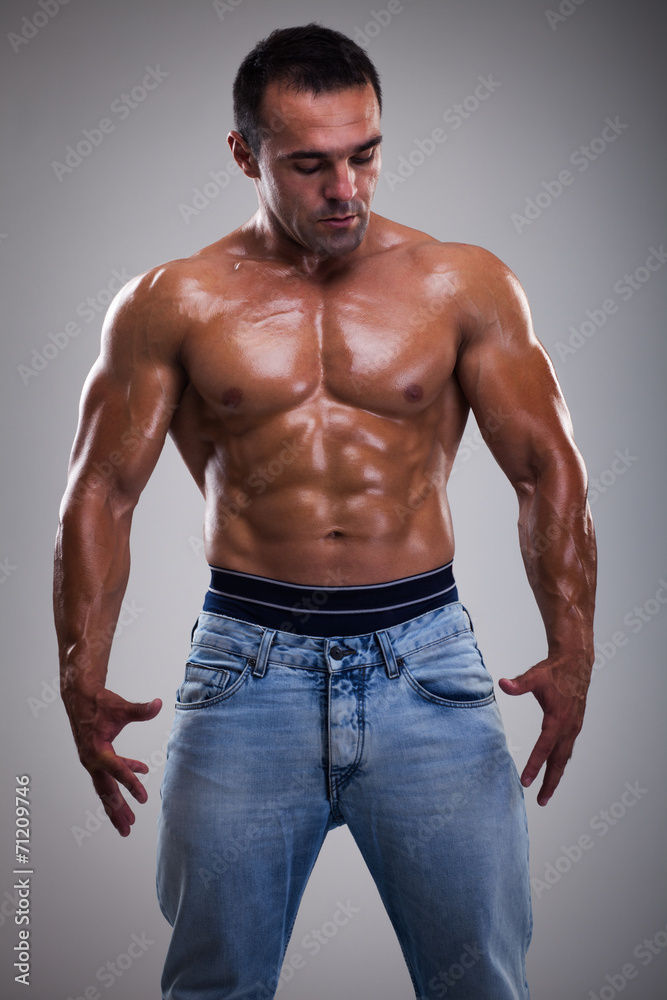 Portrait of a handsome muscular bodybuilder posing Portrait of a handsome muscular bodybuilder posing