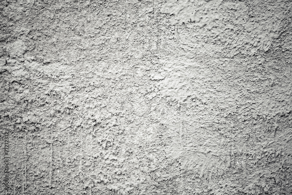 Closeup rough gray concrete wall texture with plaster