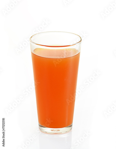 Fresh carrot juice glass. Isolated on white background