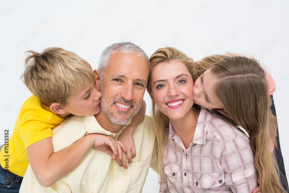 Happy family smiling and showing affection Happy family smiling and showing affection