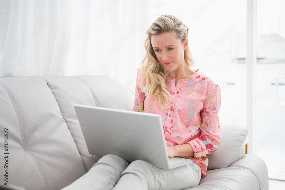Beautiful blonde woman using laptop Beautiful blonde woman using laptop