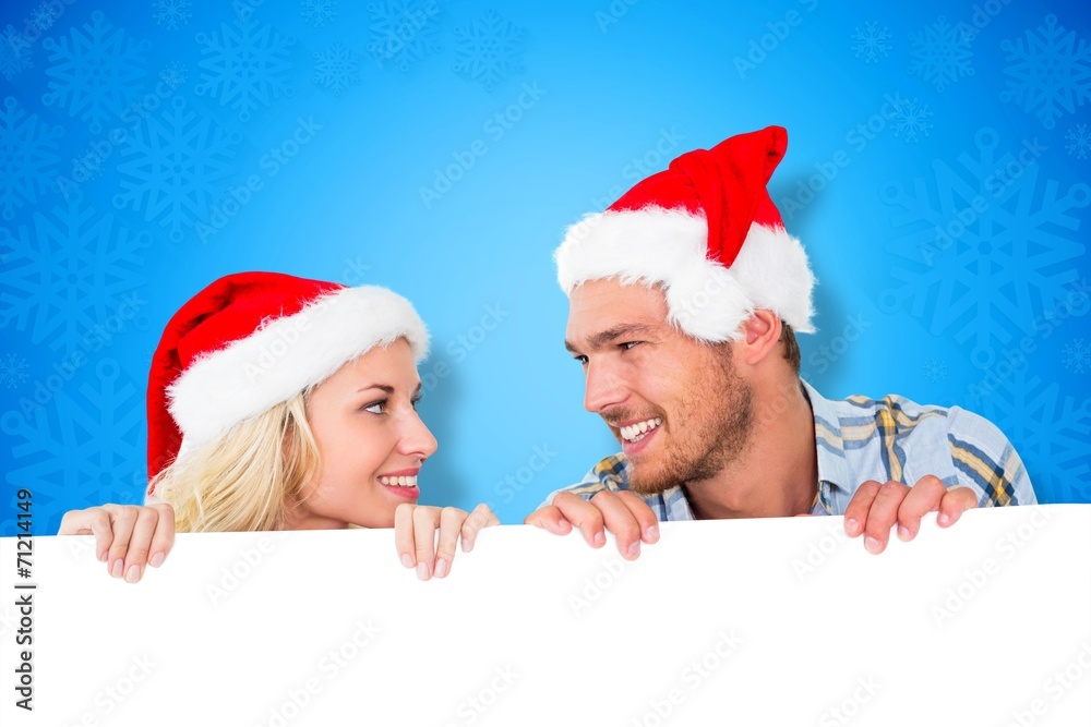 Composite image of young festive couple Composite image of young festive couple