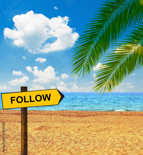 Tropical beach and direction board saying FOLLOW © irishmaster