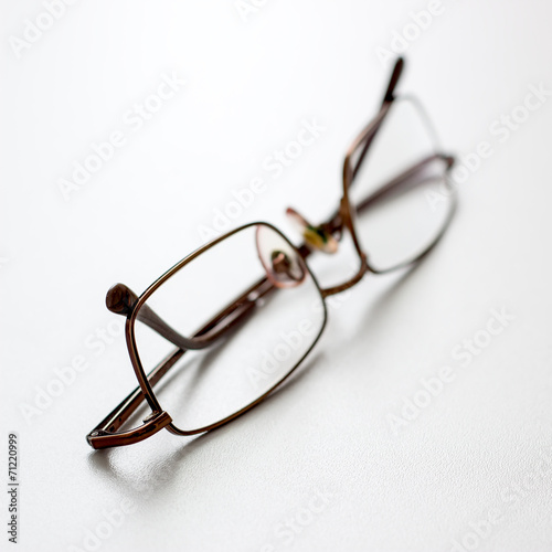 close up of spectacles on desk