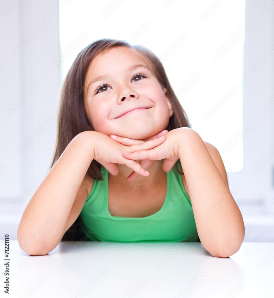 Cute girl is holding her face in astonishment Cute girl is holding her face in astonishment
