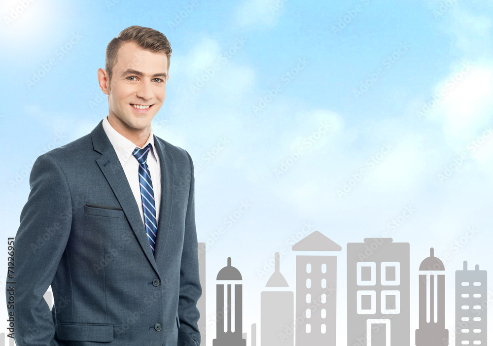Businessman with city skyline background Businessman with city skyline background