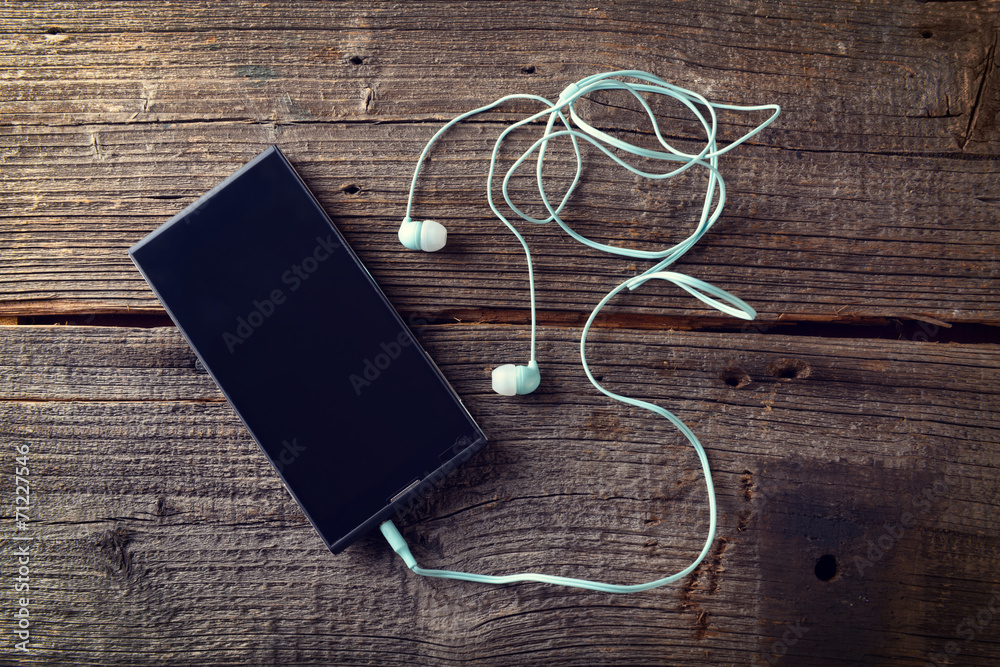 Small headphones with mobile phone Small headphones with mobile phone