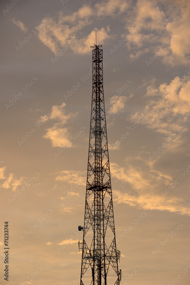 Mobile phone communication repeater antenna tower as Silhouette