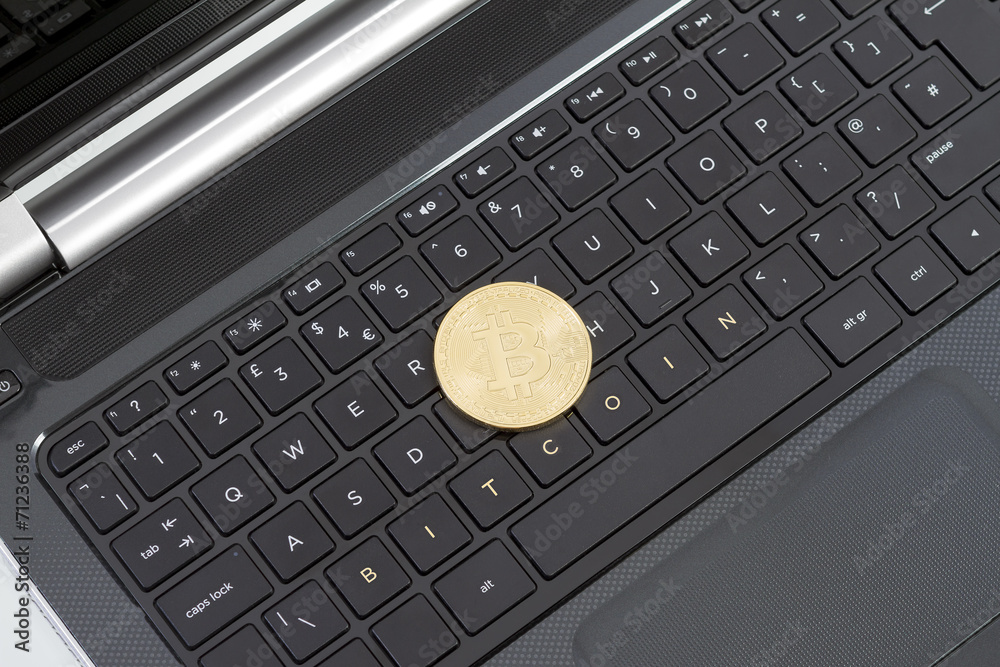 Photo Golden Bitcoin (new virtual money) Photo Golden Bitcoin (new virtual money)