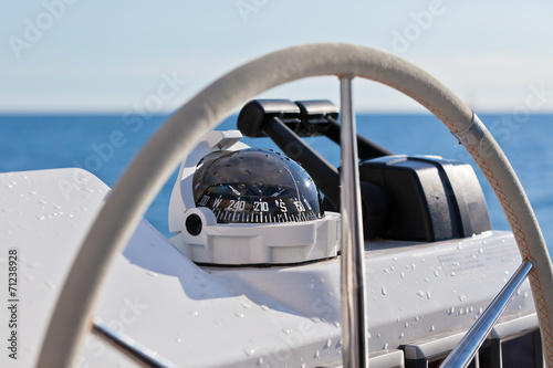 Sailing yacht control wheel and implement © dvoevnore