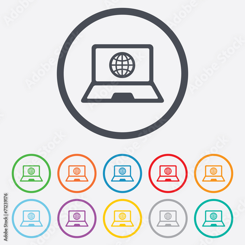 Laptop sign icon. Notebook pc with globe symbol