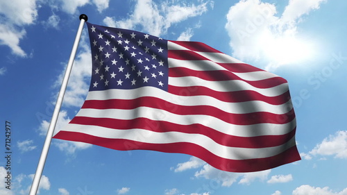 flag of USA with fabric structure against a cloudy sky