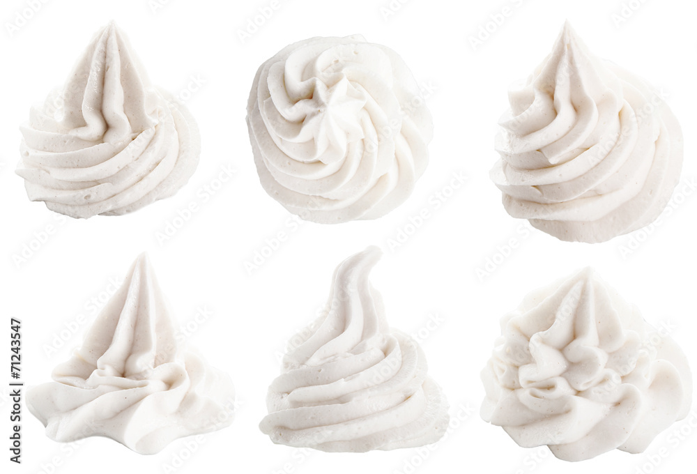 Obraz premium Decorative swirling toppings for dessert on white