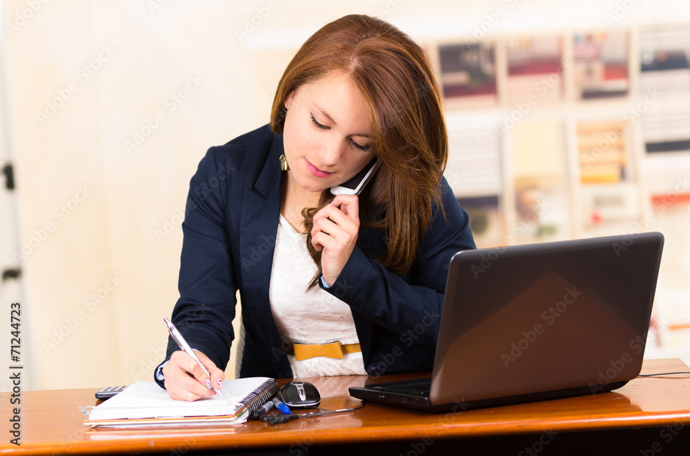 secretary using cell phone secretary using cell phone