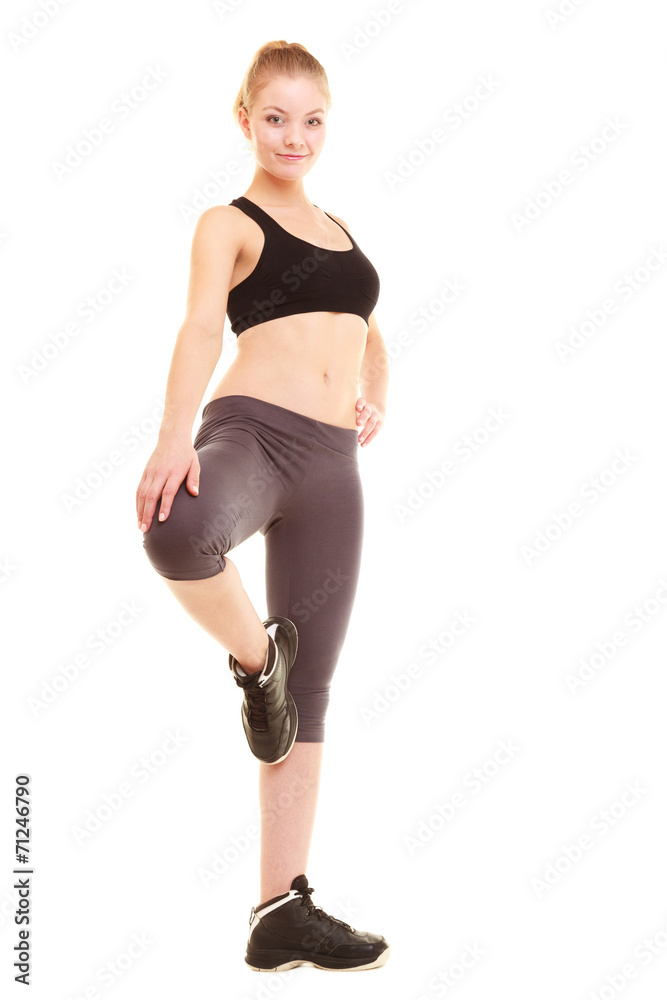 sport. fitness sporty blonde girl stretching leg isolated