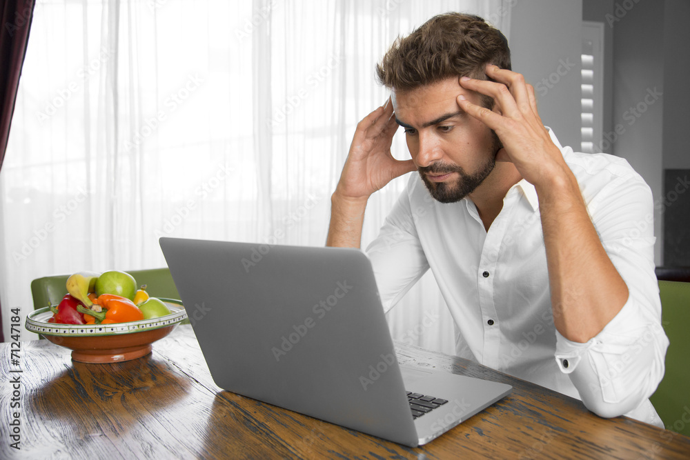 Man is shocked after opening an email Man is shocked after opening an email