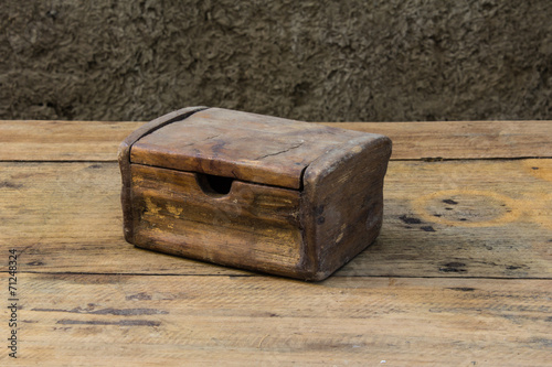 Old chest on wooden table still life