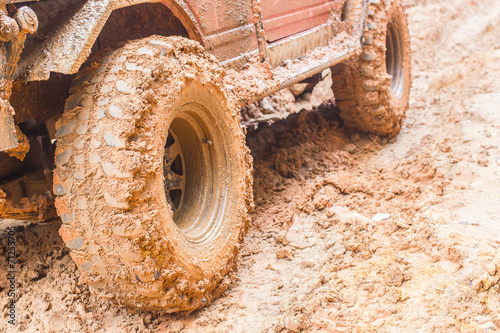 close-up shot of wheel in dirt.