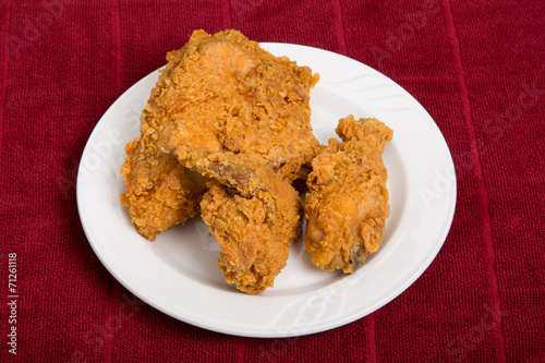Fried Chicken on Small White Plate and Red Towel
