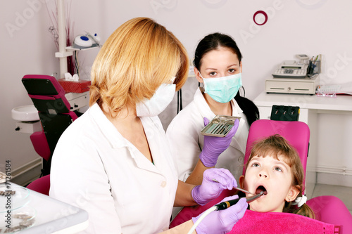 dentist nurse and child dental exam