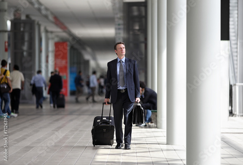 businessman travel with trolley