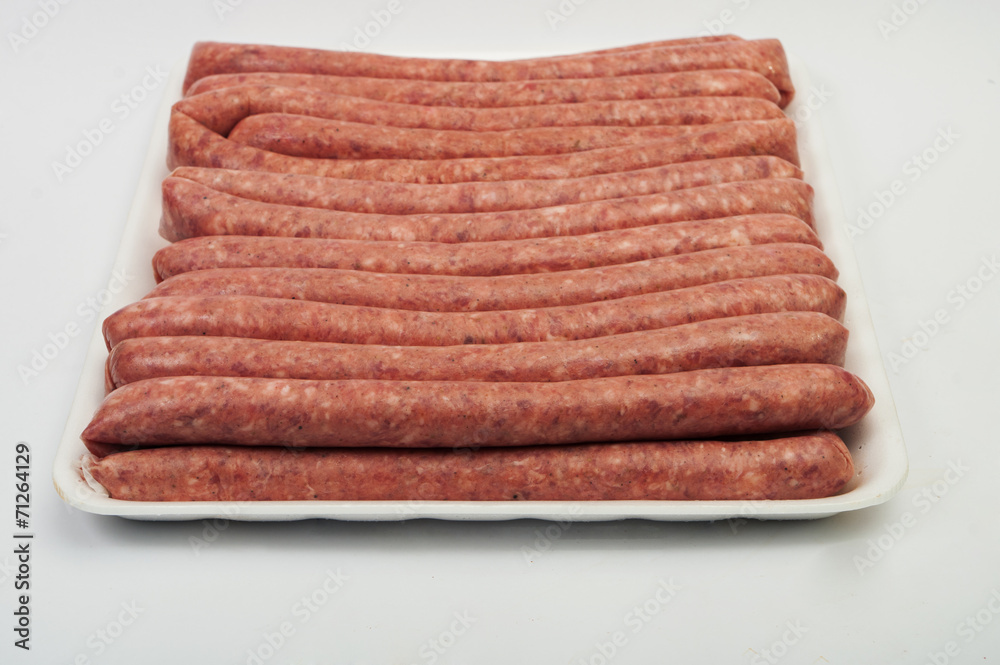 fresh raw sausage on white background