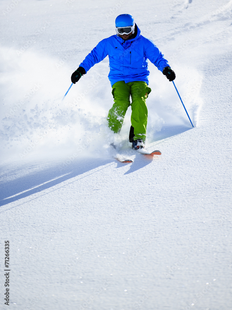 Skiing, Skier, Freeride in fresh powder snow Skiing, Skier, Freeride in fresh powder snow