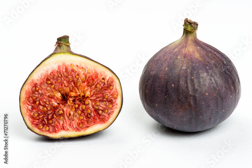 Fresh ripe figs on white
