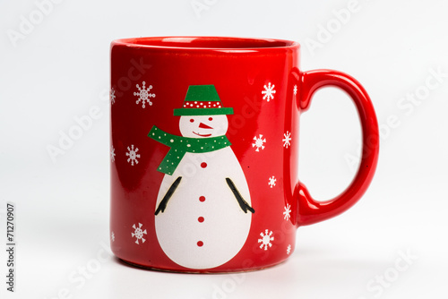 Red christmas tea mug with snowman on white
