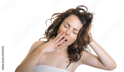 Exhausted or bored woman in yawn