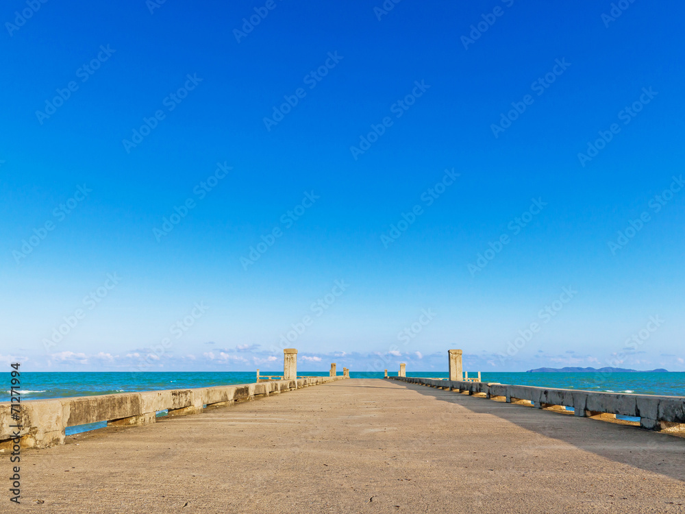 Dock with beach on summer