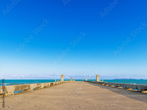 Dock with beach on summer