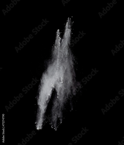 Freeze motion of colored dust explosion isolated on black