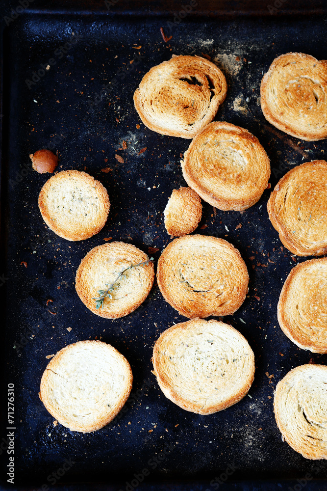 toasted bread on a baking sheet toasted bread on a baking sheet