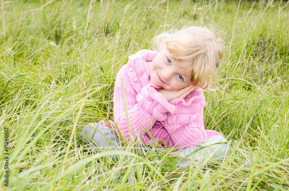 Fototapeta premium blond girl on meadow