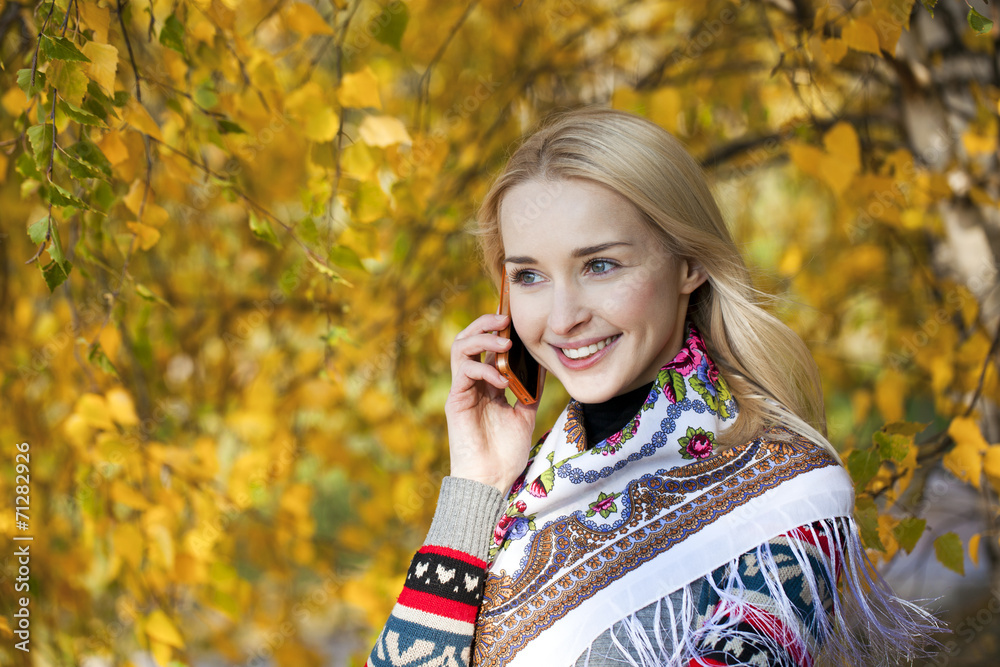 Portrait of a beautiful young woman calling by phone Portrait of a beautiful young woman calling by phone