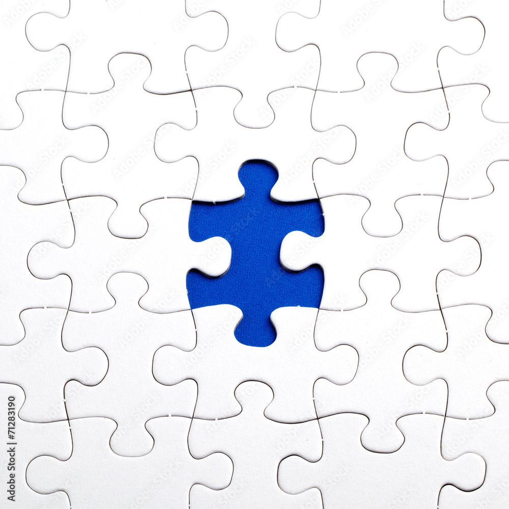 Plain white jigsaw puzzle, on Blue background Plain white jigsaw puzzle, on Blue background