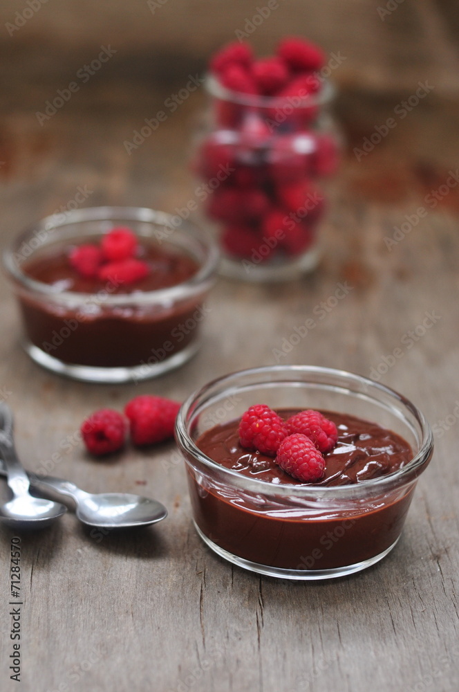Chocolate mousse with raspberries, selective focus Chocolate mousse with raspberries, selective focus