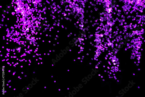 purple  glitter sparkle on black background