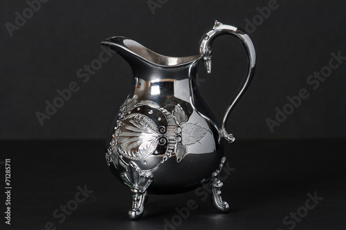 Old Silver Pitcher With Decorative Stamping Pattern