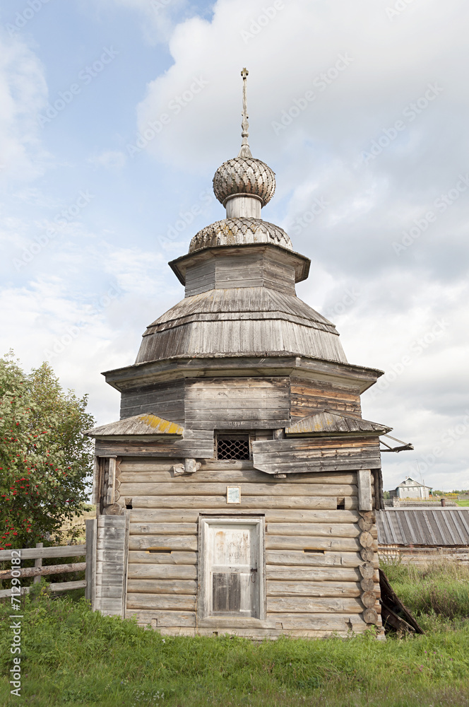 Ancient wooden chapel in russian village